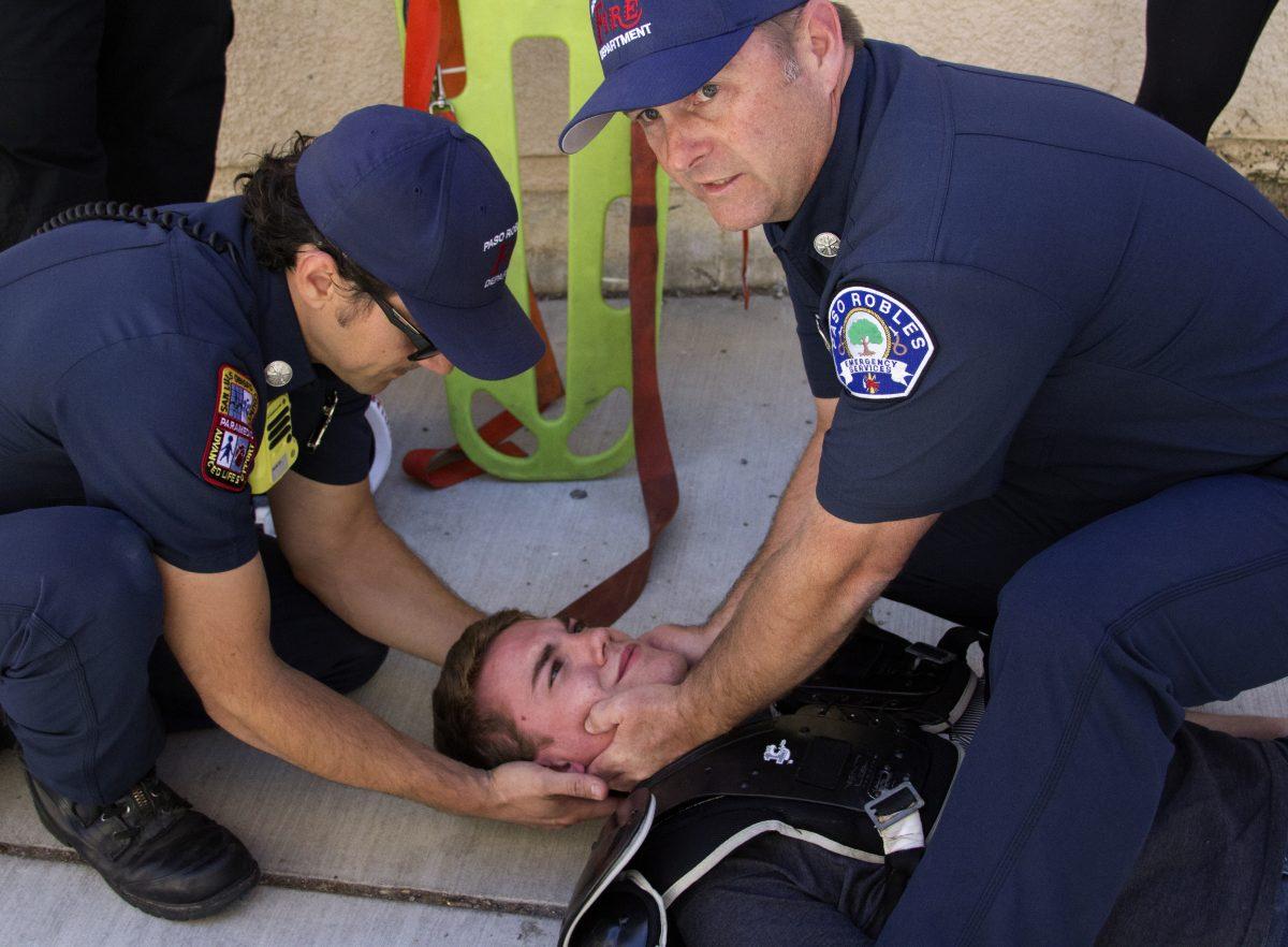 SLO+Ambulance+personnel+provide+a+mock+simulation+for+Athletic+Training+students.