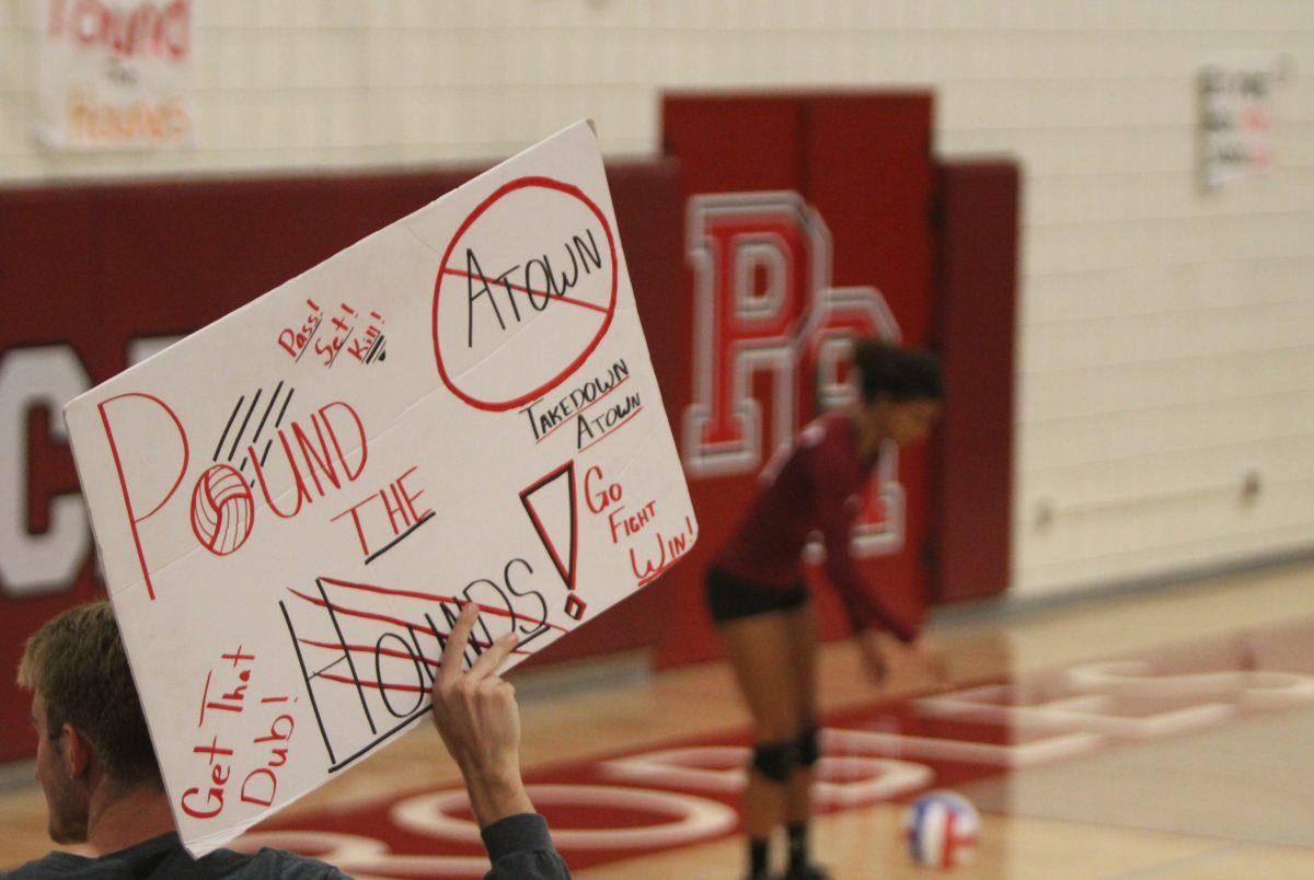 Bearcat supporters held signs during the game.