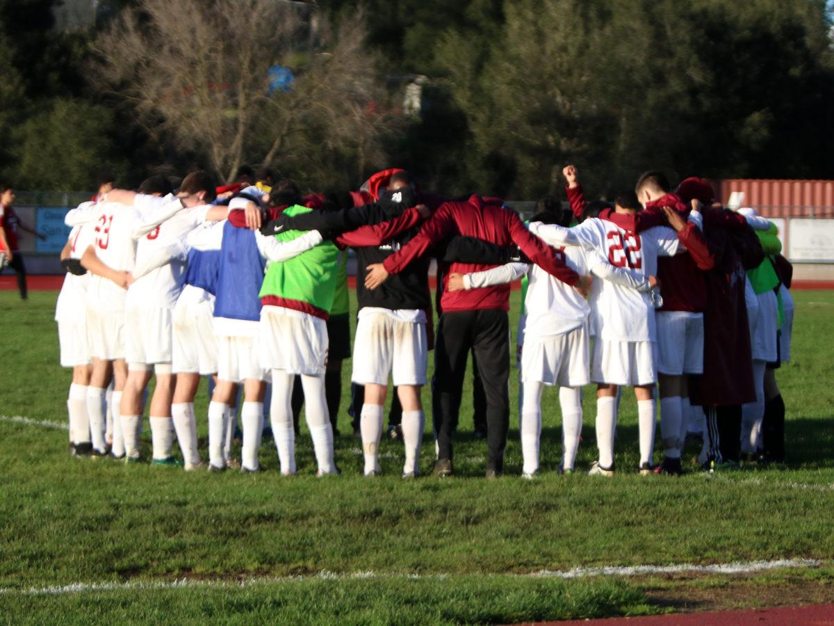 The+bearcats+pray+before+the+game.+This+is+the+CIF+Second+Round+for+the+boys.