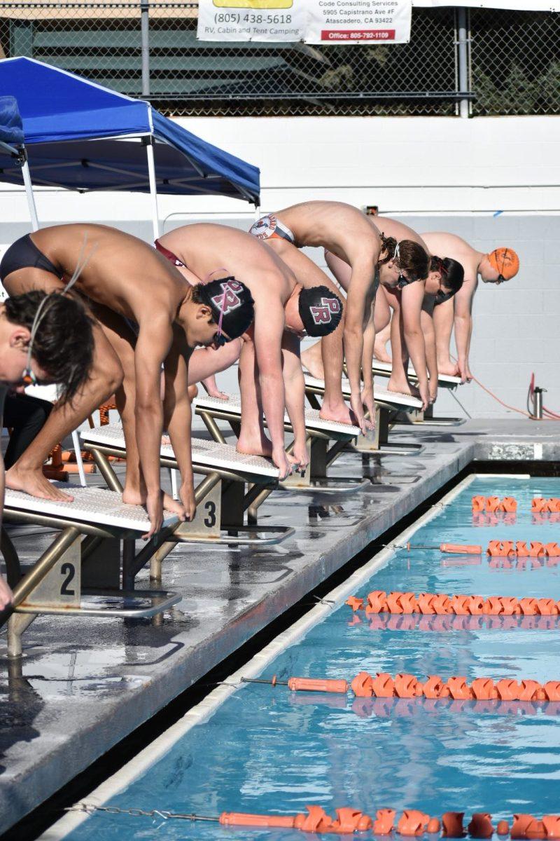 Paso Bearcats Drown the Hounds in Rival Atascadero Swim Meet