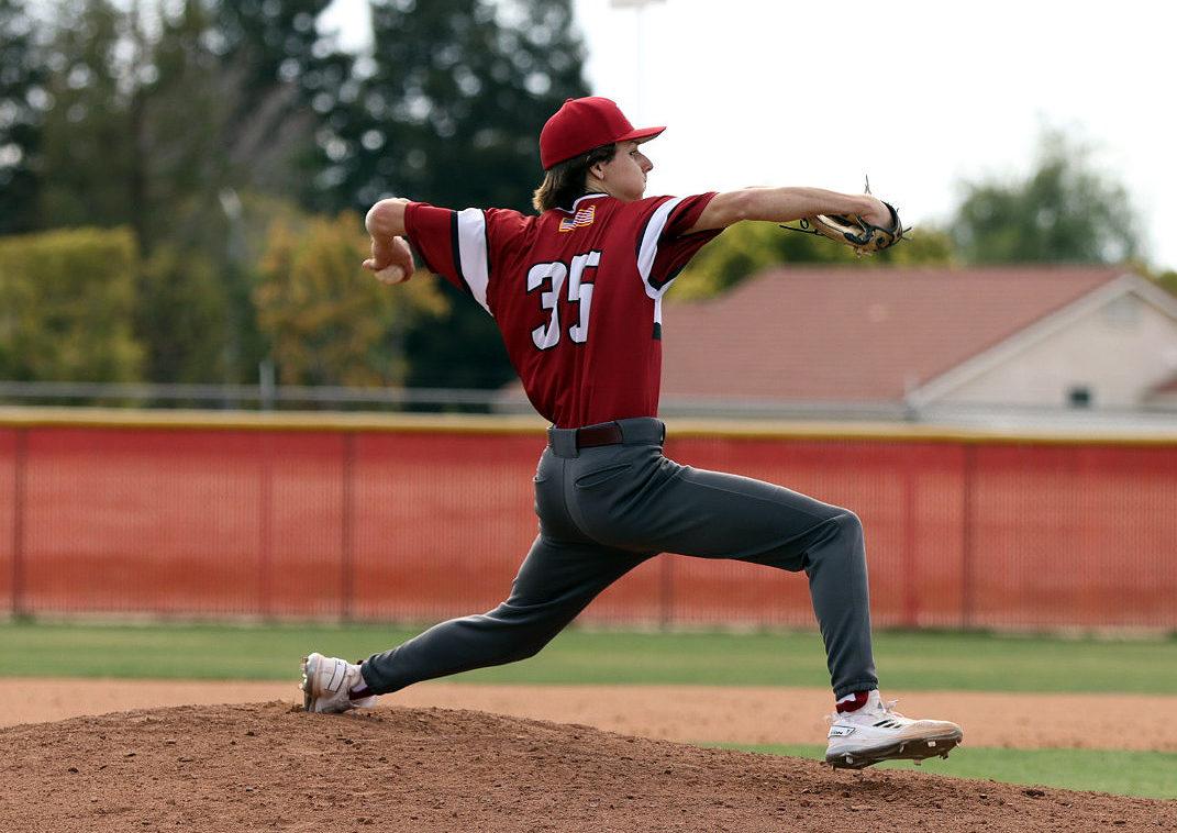 Senior Pitcher, Austin Taylor pitches the ball for a strike.