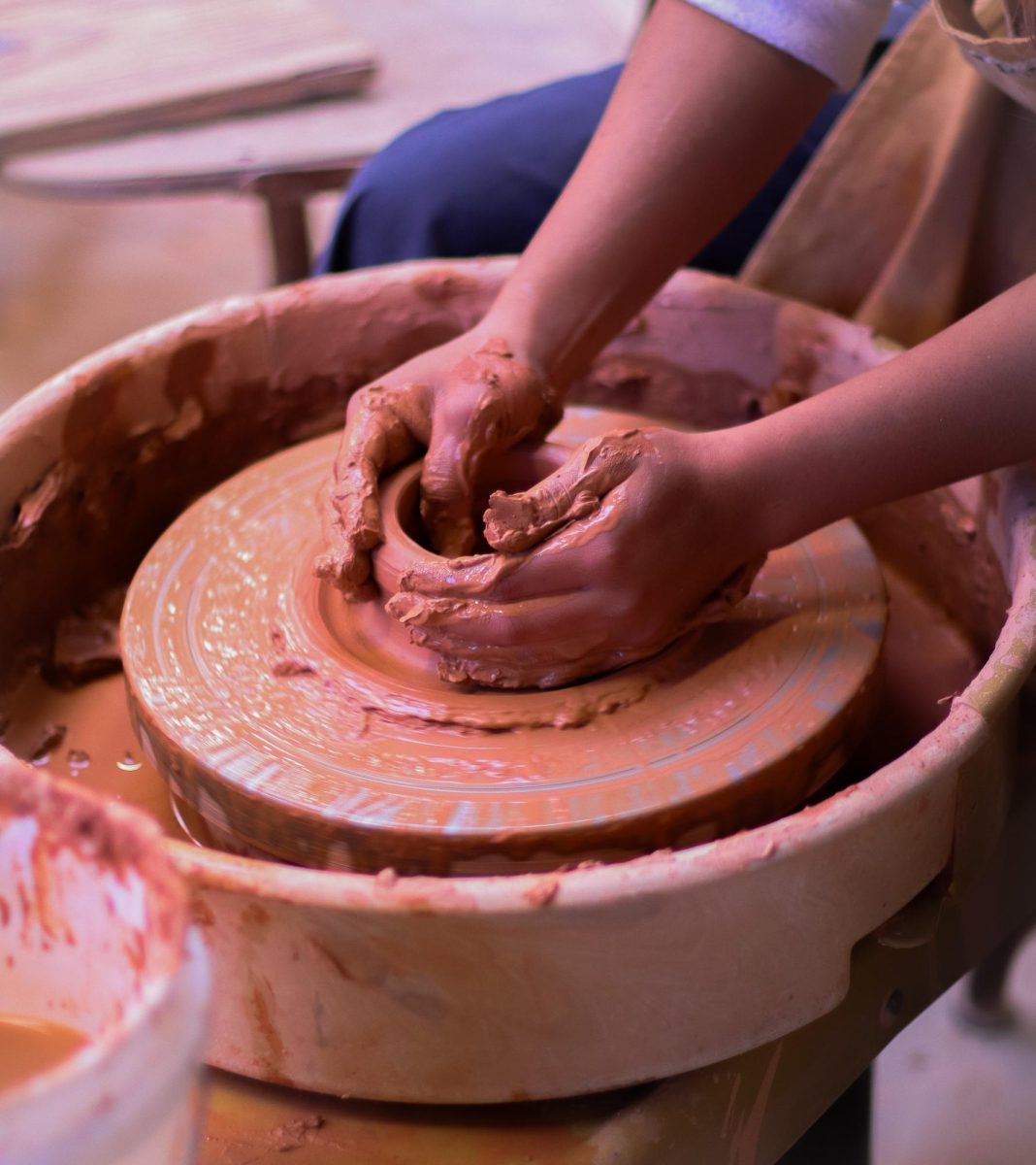 The ceramics class moved their project to the wheels in order to form their bowls. 