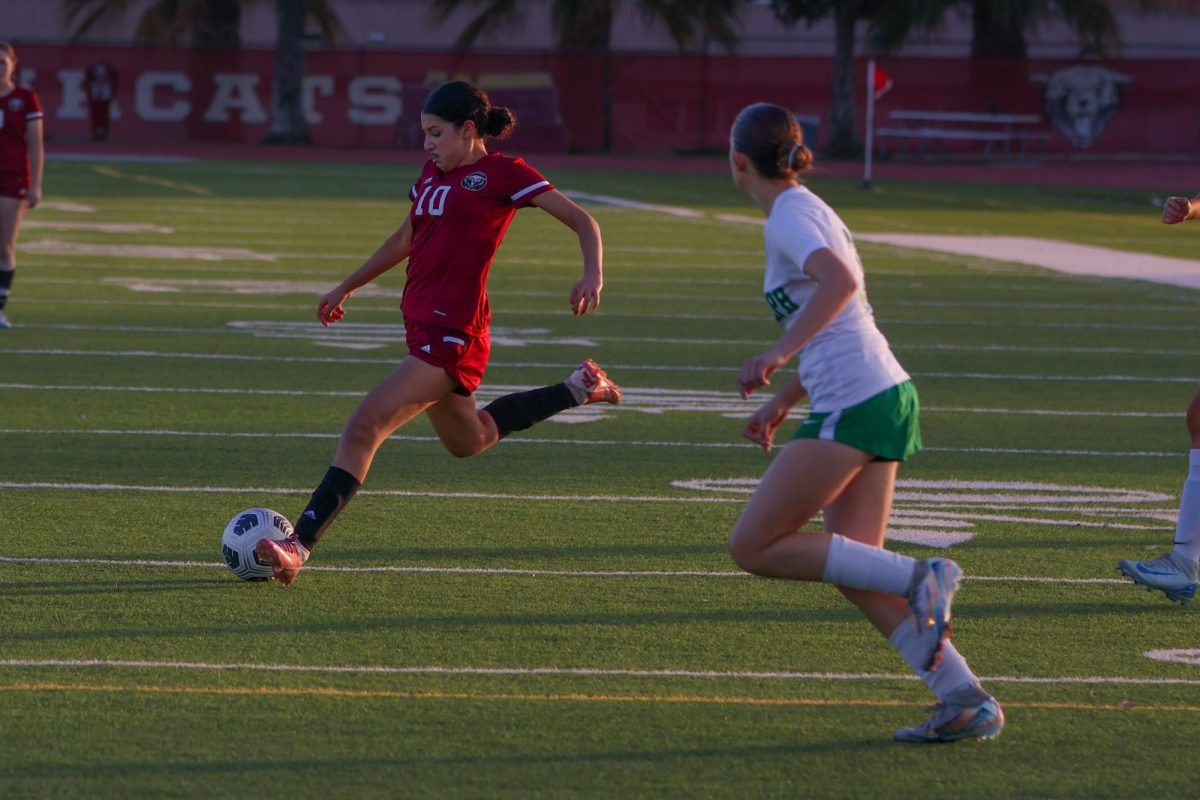 Mayte Rendon, 9, getting ready to send the ball to the opposite side of the field. 