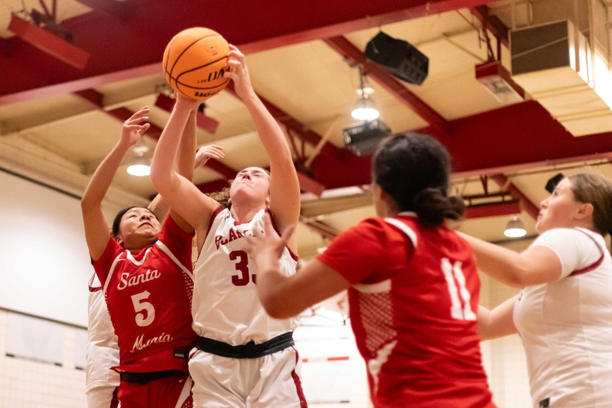 INTERCEPTED - Sill jumps to block Santa Maria’s attempt, preserving the Bearcats’ momentum.
