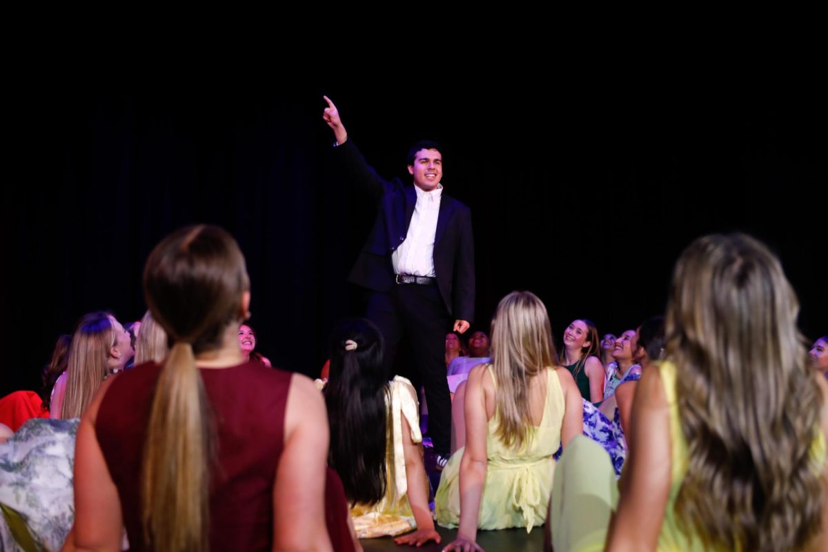Torres Gaisi points up to the air, celebrating his succesful prom night.